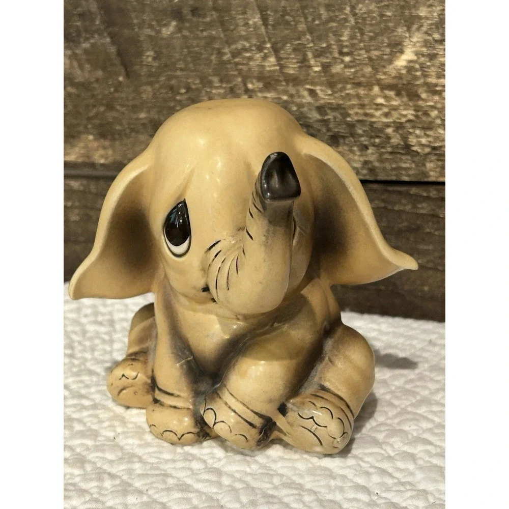 Vintage Elephant Piggy Bank. Signed BK-8. Normal Wear. 4 1/2 inches tall.